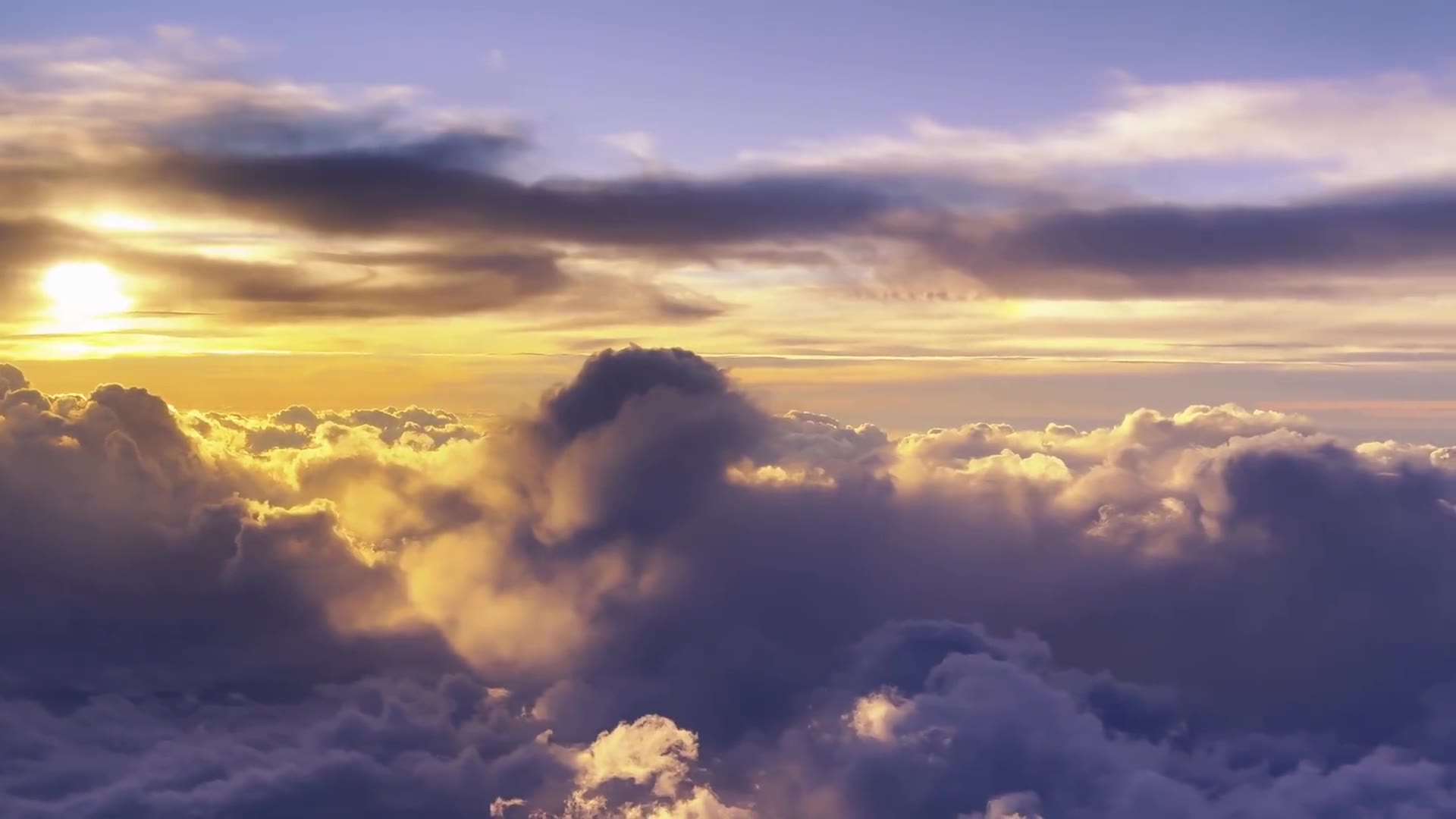 Daylight sky with drifting clouds